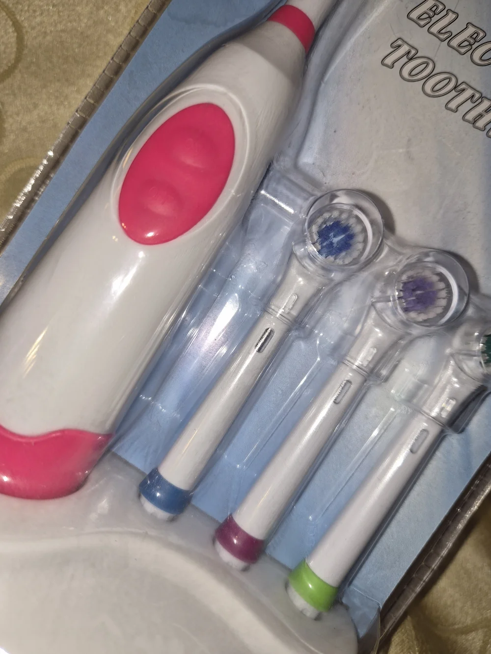 Electric Toothbrush with Pink Accents and 4 Replacement Heads